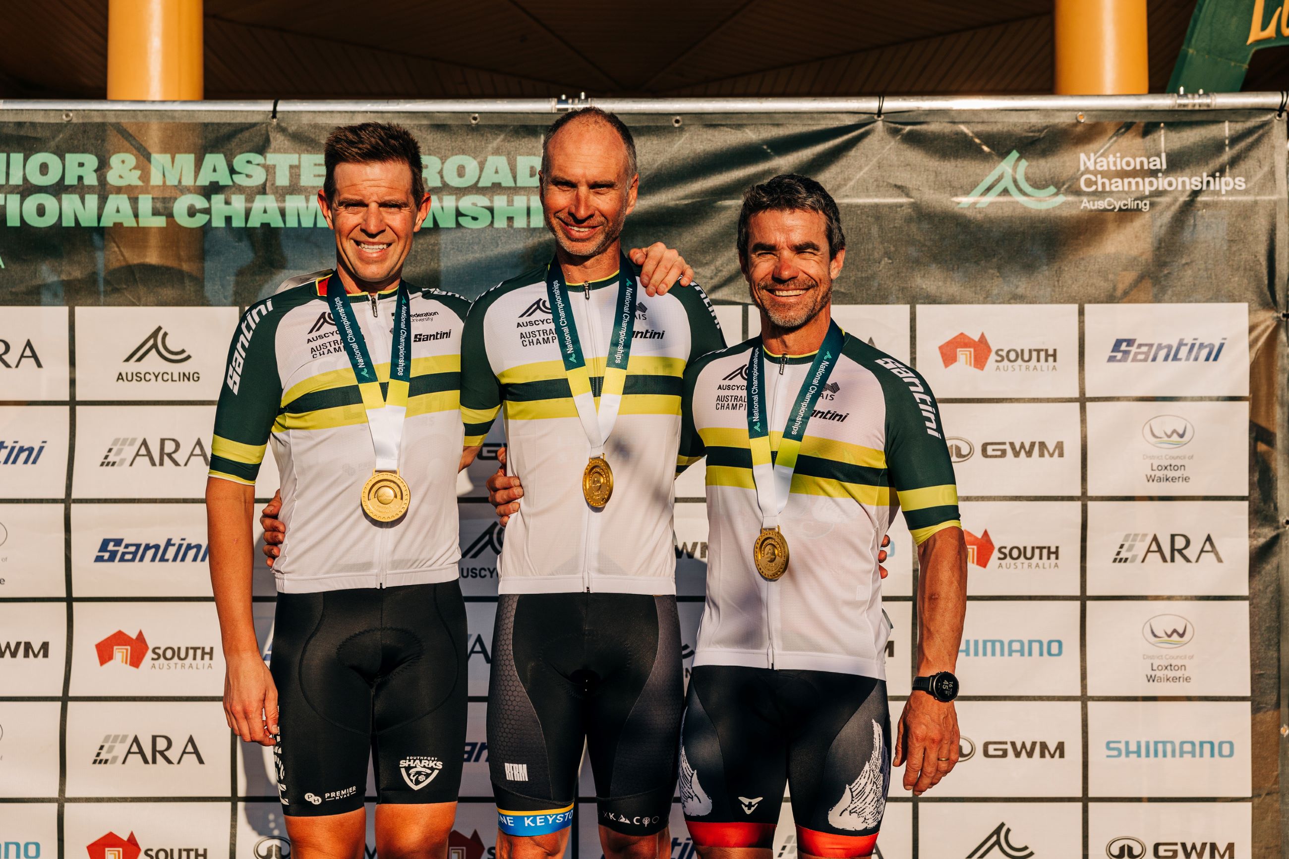 Masters Men 3, 4, 5 criterium winners Andrew Friebe, Matthew Sparnon and Chris Ling at the 2024 AusCycling Masters and Junior Road National Championships in Loxton